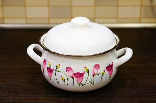 A with teapot set under sunlight
