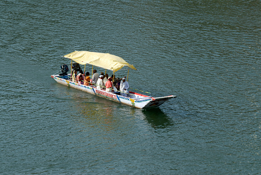 Pilgrims crossing the Narmada River by boat at Omkareshwar district Khandva Madhya Pradesh