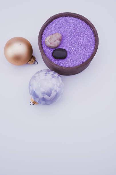 istock vase with colored sand and Christmas decorations with copy space 1466641110