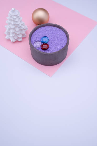 istock vase with colored sand and Christmas decorations with copy space 1466641302