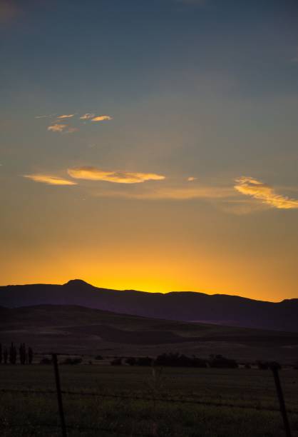 istock Pasture field below the mountain during sunset 1466642949