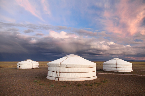 Mongolian Yurt in the Mountains during Sunrise