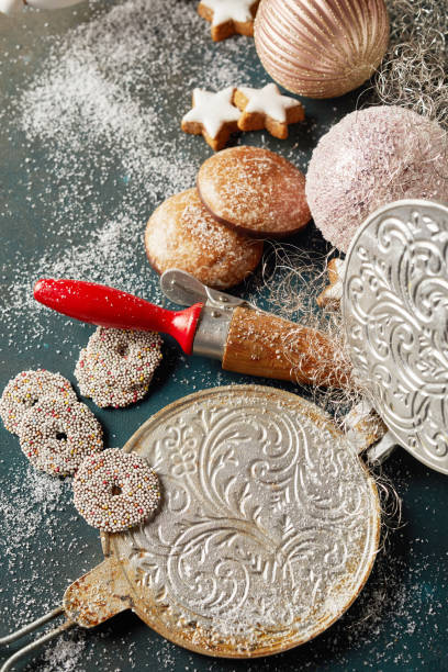 istock Baubles, a rolling pin, and shape for Christmas biscuits on the table 1466644079