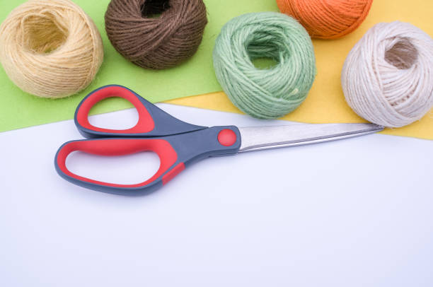 istock decoration yarn felt sheet and scissors on a bright wooden background 1466644557