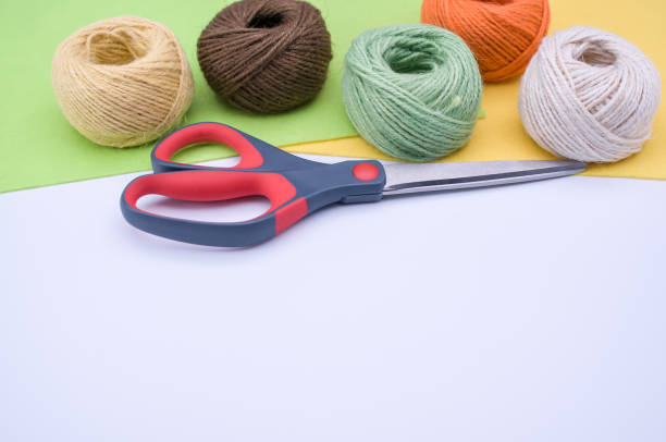 istock decoration yarn felt sheet and scissors on a bright wooden background 1466644558