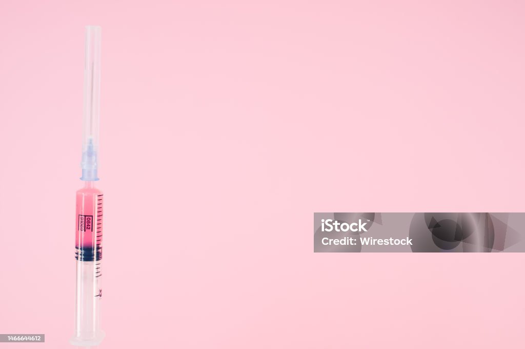 Inection Pink Color Sterilized Injection Syringe On A Pink Background Stock Photo ...