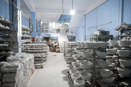 view in woman factory hall of ceramic manufacture in vietnam
