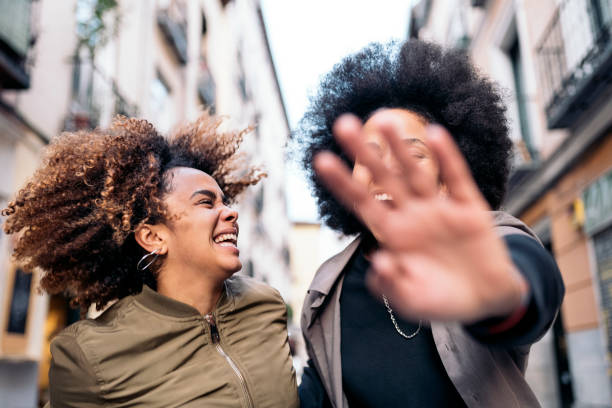istock Cheerful Afro Friends 1466668288