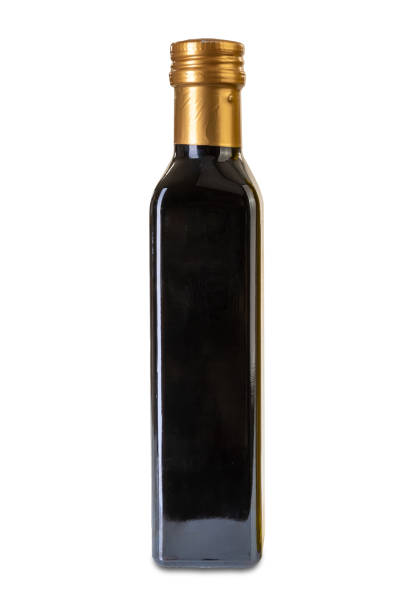 vinegar in glass bottle - vinegar balsamic vinegar modena italy imagens e fotografias de stock