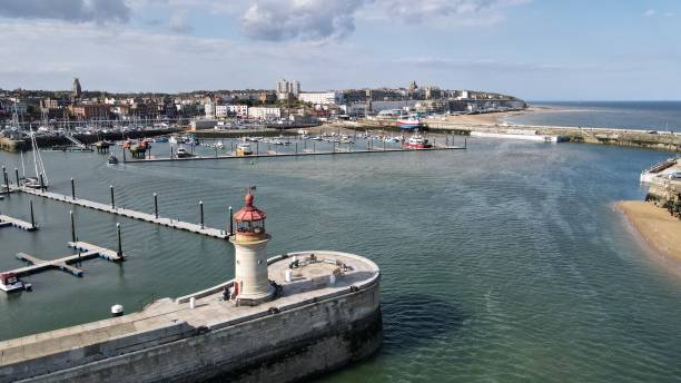 istock Lighthouse at harbour enterance Ramesgate Harbour Kent Uk aerial drone view 1466669246