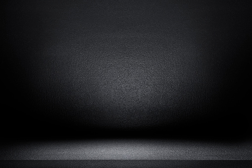 Black abstract cement wall and studio room, interior texture for display products. wall background.
