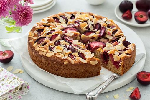 plum and almond cake, sweet and tasty fruit pie, selective focus