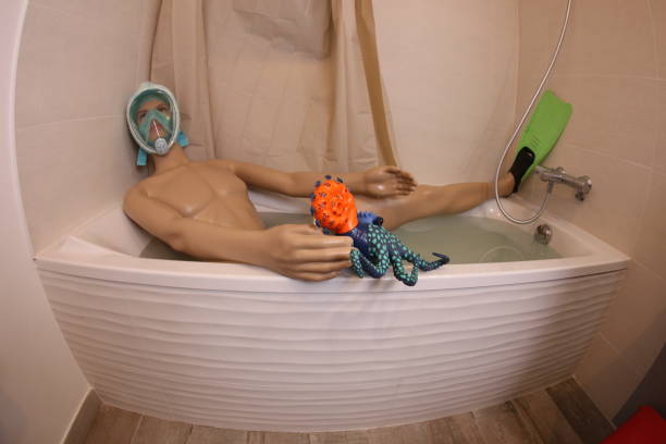 istock Humorous man snorkeling in the bathtub 1466680647