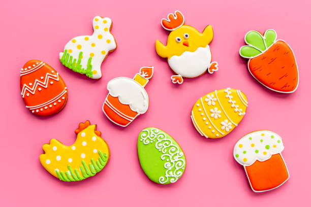 istock Easter Bunny cookies background with sugar sprinkles, top view 1466682285