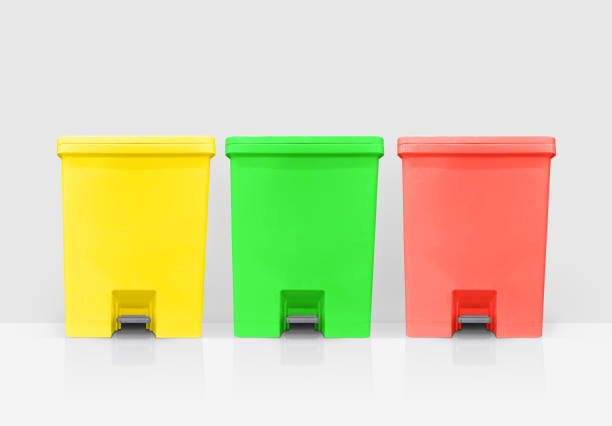istock Yellow, green, red lidded bins on a white background. 1466685028