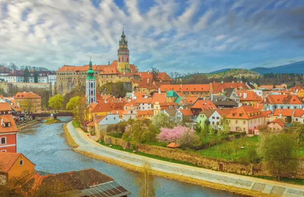 Cesky Krumlov is a beautiful medieval town located in the South Bohemian region of the Czech Republic, and during the daytime, it is a picturesque cityscape filled with charming architecture, scenic landscapes, and a bustling atmosphere.