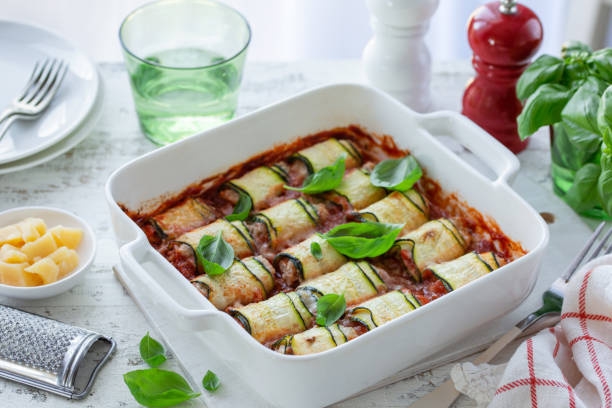 istock zucchini roll-ups with tomato sauce 1466685715
