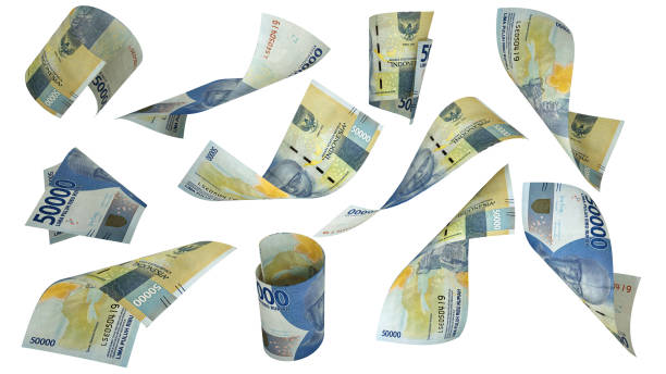 istock 3D rendering of 50000 Indonesian rupiah notes flying in different angles and orientations isolated on white background 1466688549