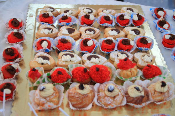 Pagani,SA,Italy-February 14,2023:The students of Institute for Hotel Services,on the day of Valentine’s Day have offered a taste of small pastry dedicated to love along with love-colored cocktails.