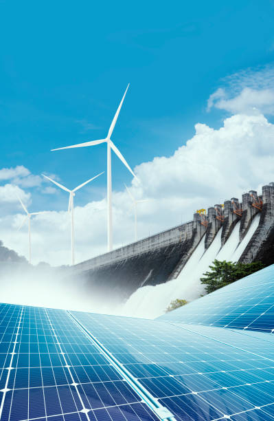 Electricity from solar panels, dams, and wind turbines. Environmentally-friendly renewable energy concept.