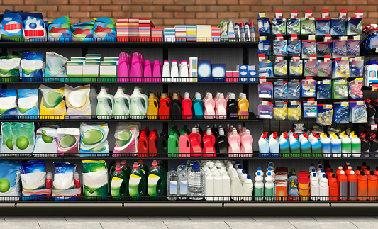 Household chemicals and Laundry Detergent  on shelf In supermarket with colorful labels. Suitable for presenting new  product and new designs of labels among many others.
