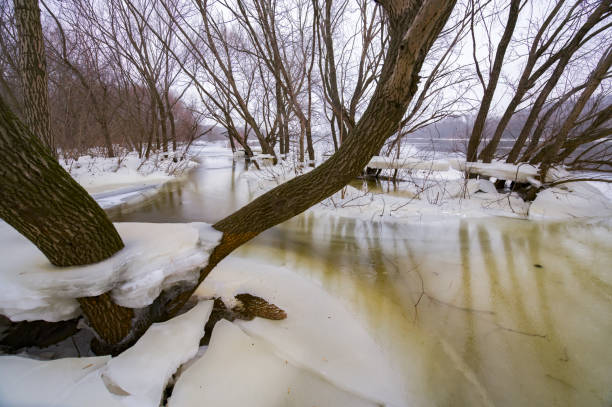 Melting ice on the river. Early spring stock photo