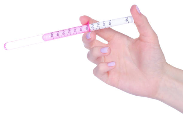 istock syringe for child syrup in hand 1466700382