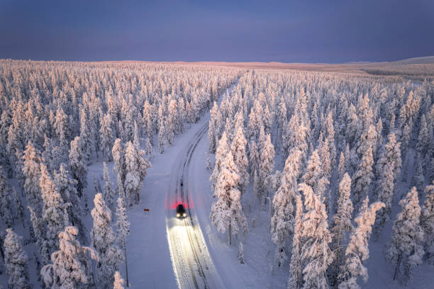 istock Car drives winter road 1466703378