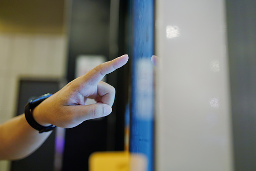 Contactless ordering food in a fast food restaurant.