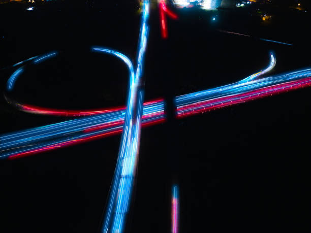 Interstate Twilight - Cars Traveling on Highway with Light Trails - Clover