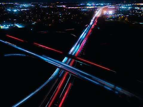 Interstate Twilight - Cars Traveling on Highway with Light Trails - Interweaving Braid - Exits