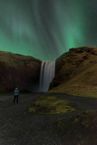 istock Skogafoss under northern lights (aurora borealis) 1466706515