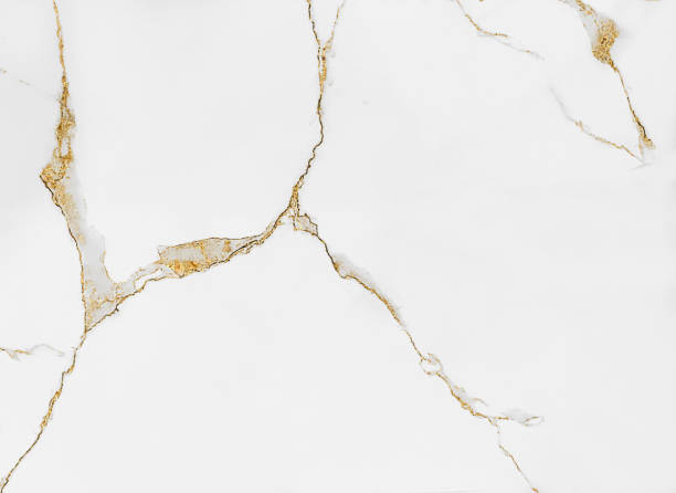 White and gold marble luxury wall texture with shine golden line pattern abstract background design for a cover book or wallpaper and banner website
