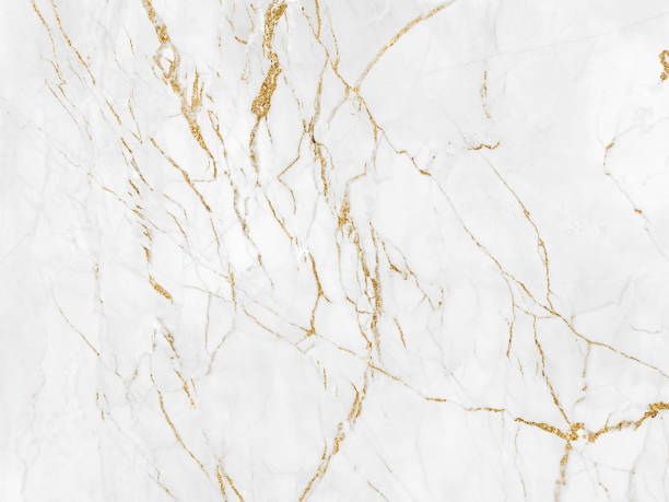 istock White and gold marble luxury wall texture with shine golden line pattern abstract background design for a cover book or wallpaper and banner website 1466708690