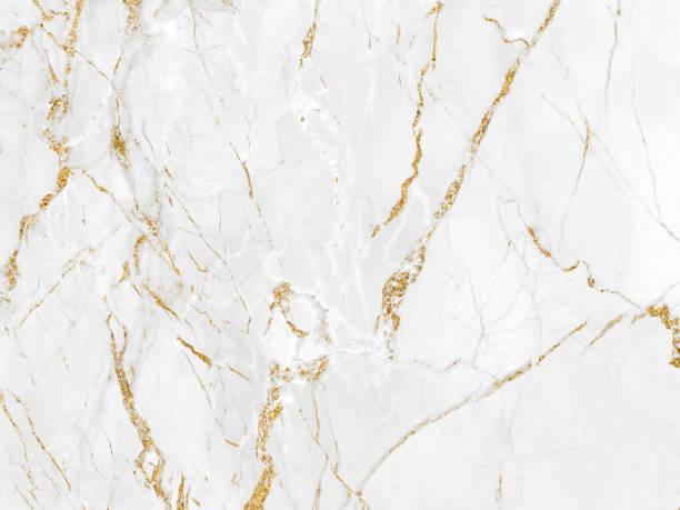 istock White and gold marble luxury wall texture with shine golden line pattern abstract background design for a cover book or wallpaper and banner website 1466708696