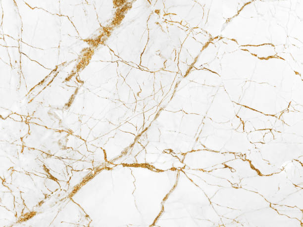 istock White and gold marble luxury wall texture with shine golden line pattern abstract background design for a cover book or wallpaper and banner website 1466708794