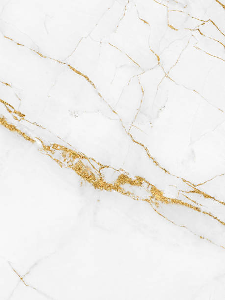 istock White and gold marble luxury wall texture with shine golden line pattern abstract background design for a cover book or wallpaper and banner website 1466709179