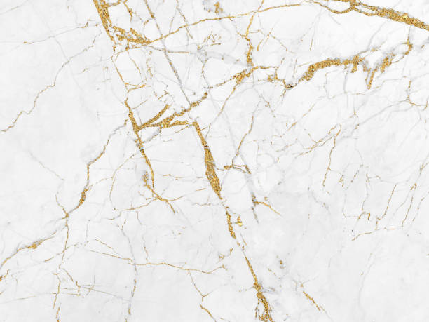 istock White and gold marble luxury wall texture with shine golden line pattern abstract background design for a cover book or wallpaper and banner website 1466709268