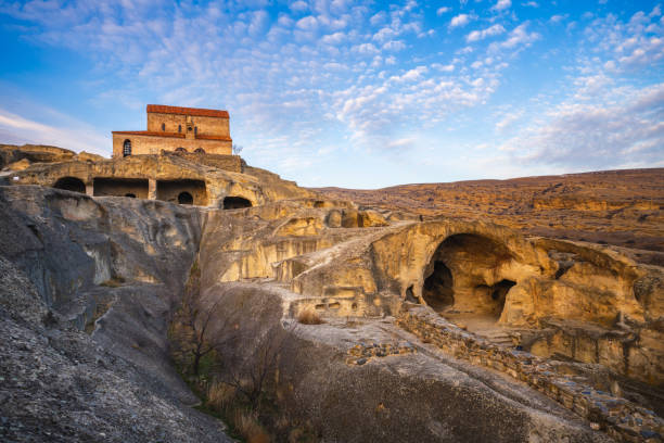 Uplistsikhe cave complex with a 9th/10th century three-nave basilica. Gori, Georgia stock photo