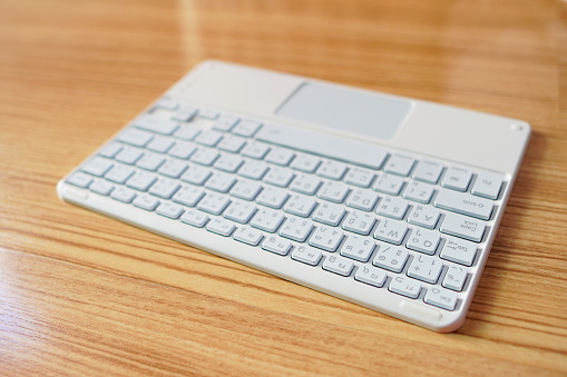 Portable white Computer keyboard with pad