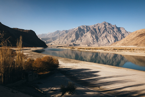 Scenic view of the Indus River at the sunset autumn in Skardu, Pakistan
