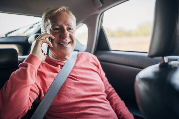 istock Modern senior man riding in taxi 1466719240