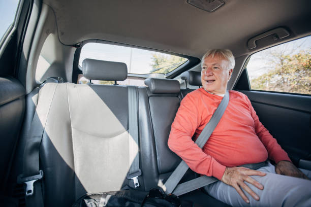 istock Senior man in a taxi 1466720283