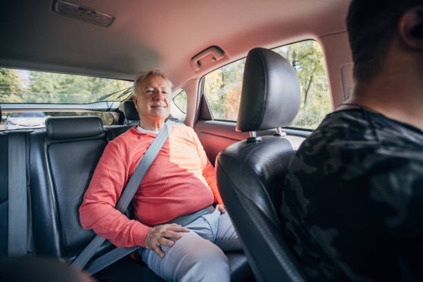 istock Senior man in a taxi 1466720385