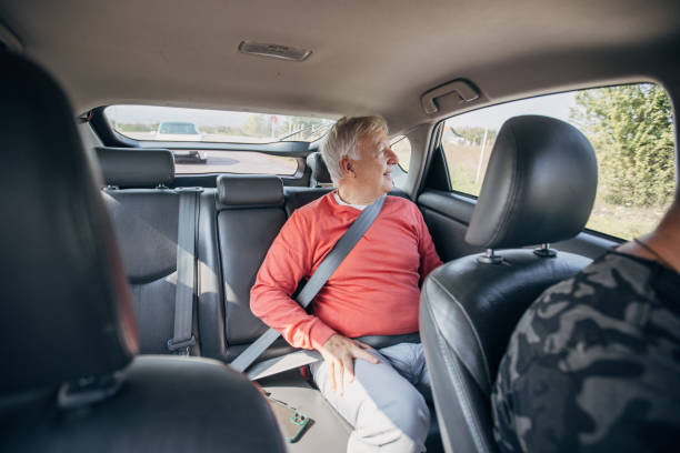 istock Senior man in a taxi 1466720425
