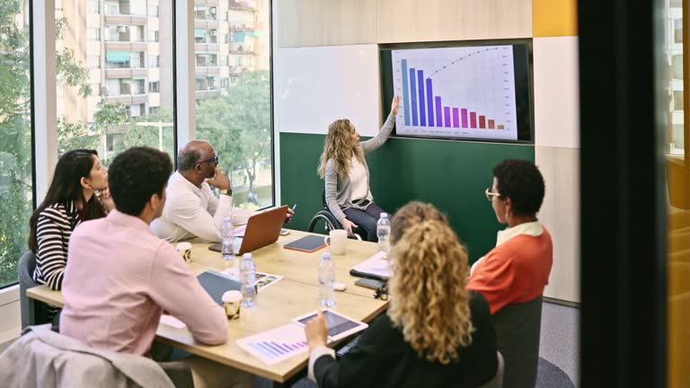 Diverse business team listening to presentation