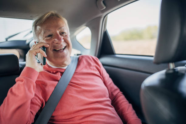 istock Modern senior man riding in taxi 1466725861