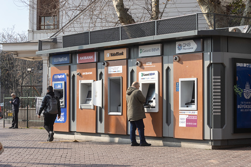 Istanbul,Turkey- February 16 ,2023:Turkish different bank ATM in Beşiktaş District.
