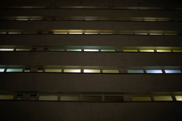 istock Windows in building at night. Light in house. 1466727500