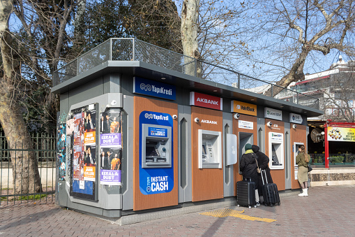 Istanbul,Turkey- February 16 ,2023:Turkish different bank ATM in Beşiktaş District.